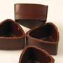 Praline bowls from Laderach and others Praline shells for tempting fillings Praline bowls from Laderach and others Praline shells for tempting fillings